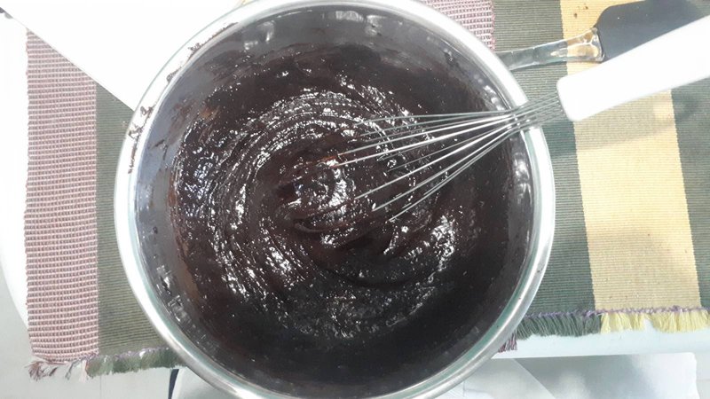 Smooth chocolate mixture in a mixing bowl